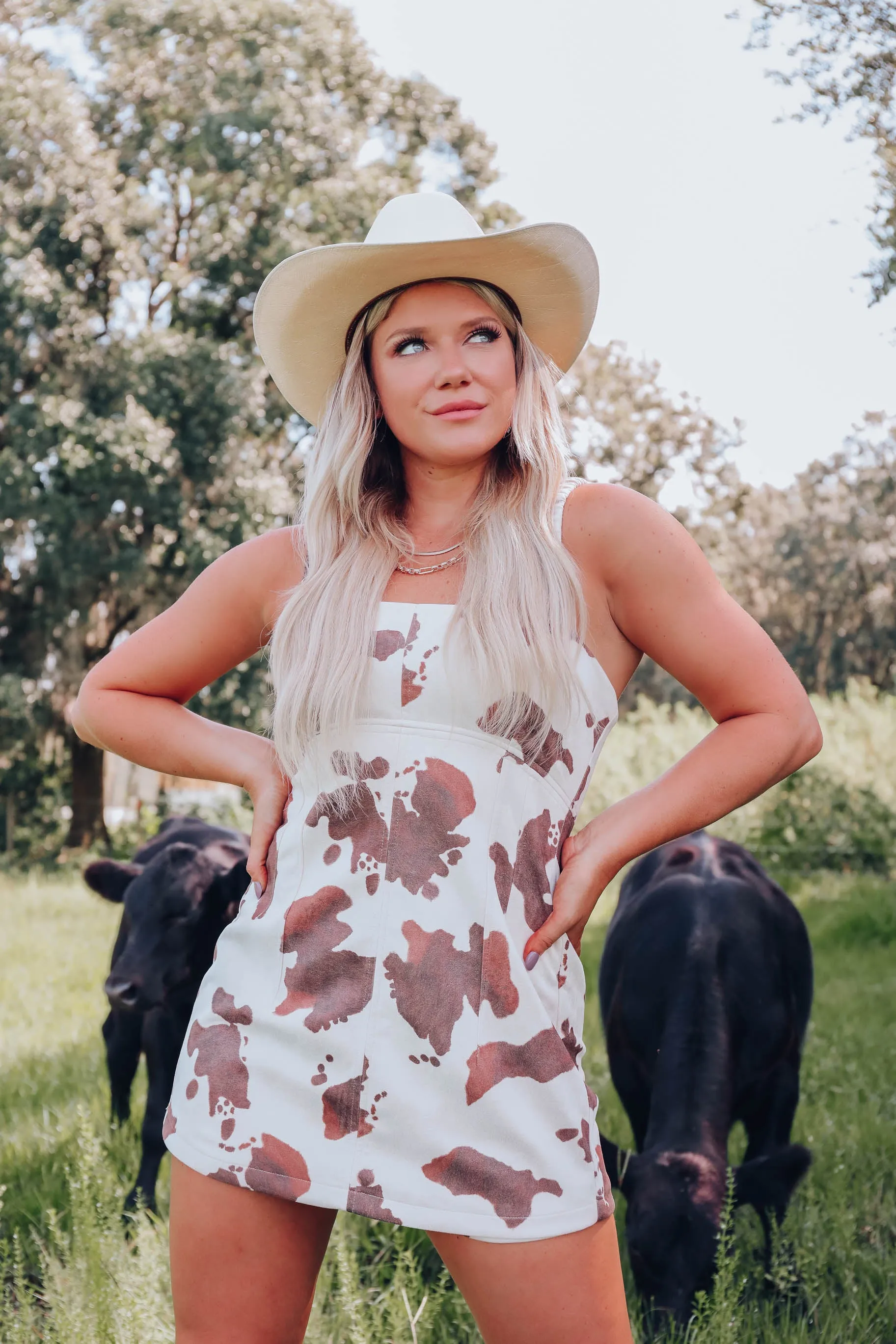 Morgan Cow Print Suede Romper